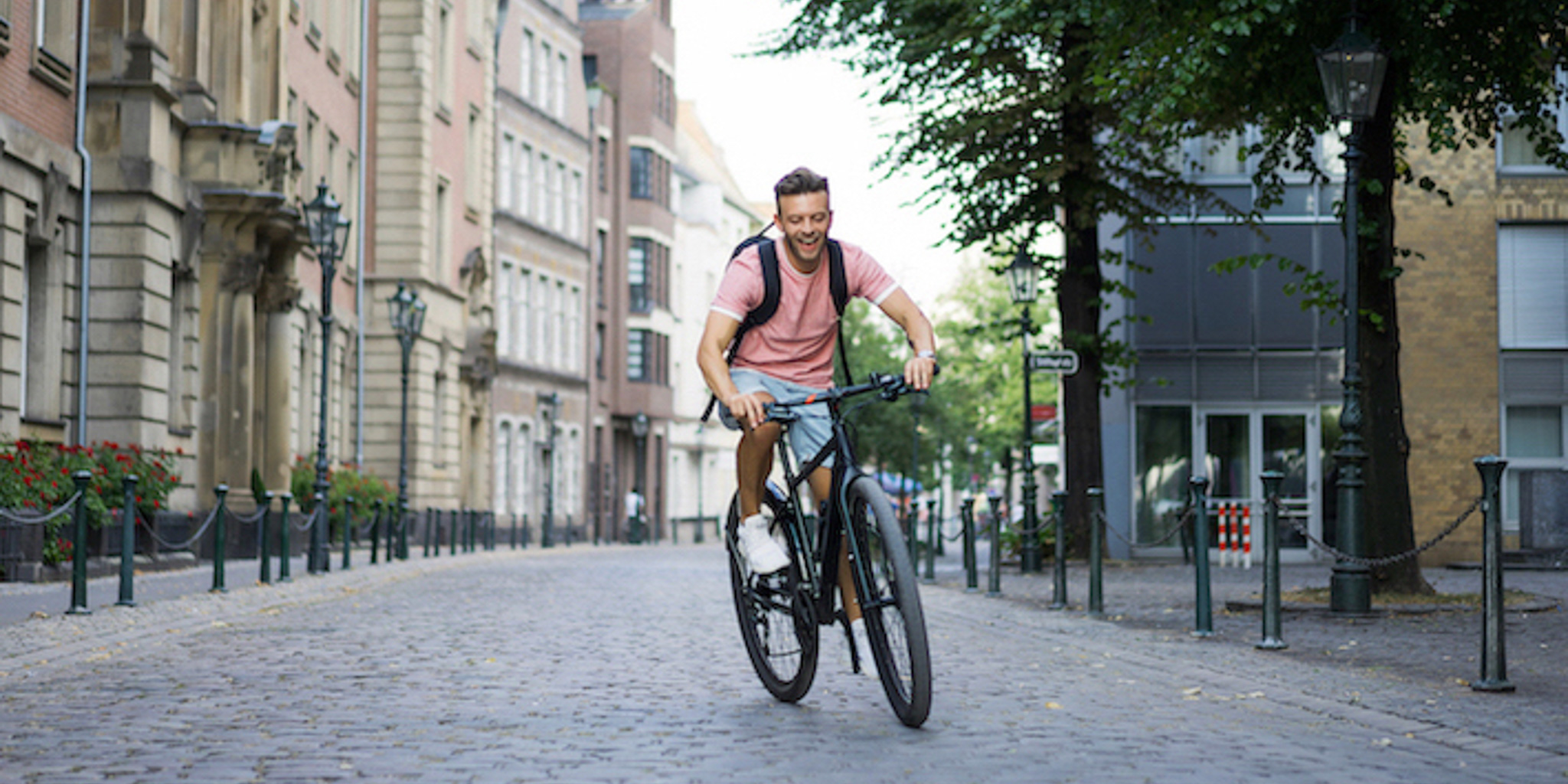 young-sports-man-bicycle-european-city-sports-urban-environments-2-1